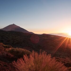 Beautiful sunset in nature. View of the volcano Teide in last sunbeams. Tenerife, Canary Islands.